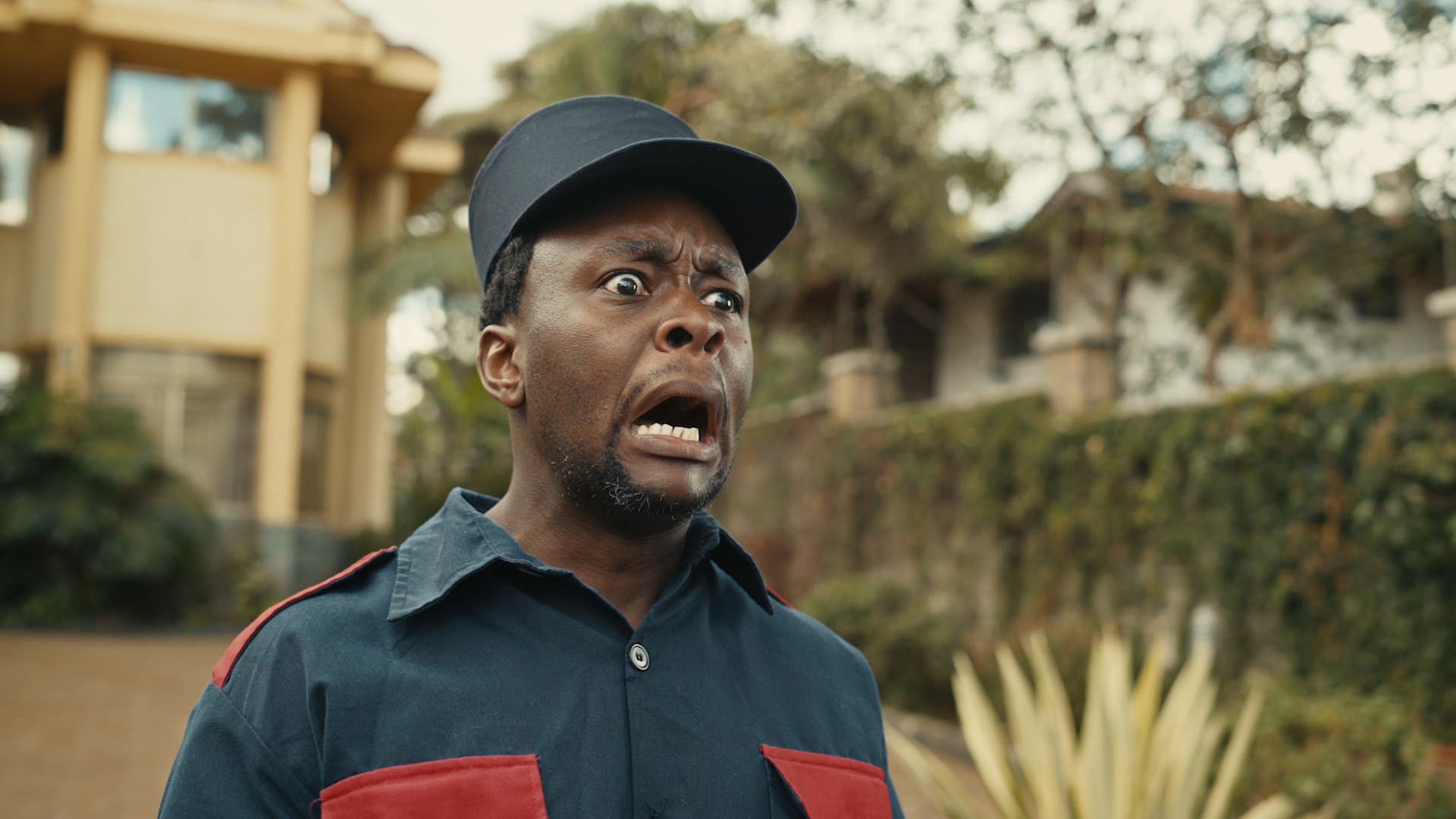 A startled security guard in a still from A Guide to Dining Out in Nairobi, Best Comedy 2021