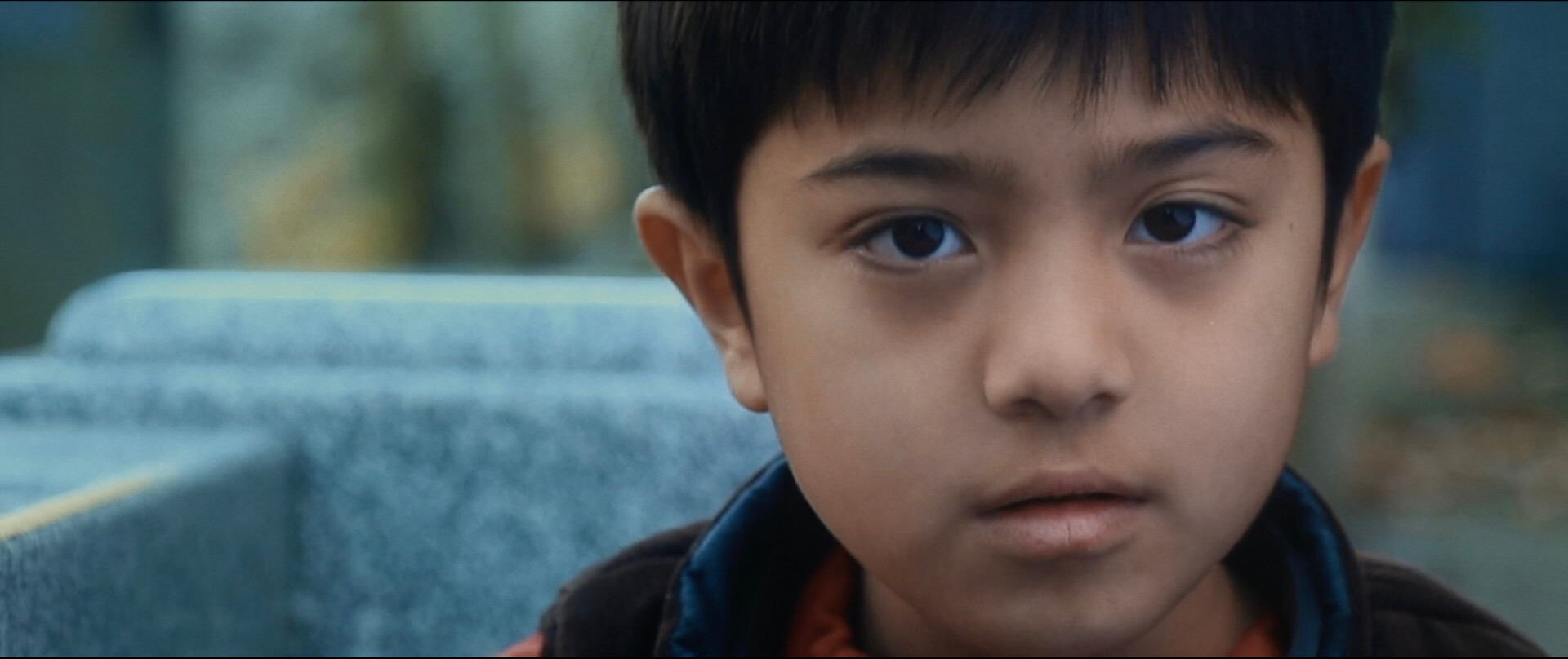 A young boy in a still from The Old Young Crow
