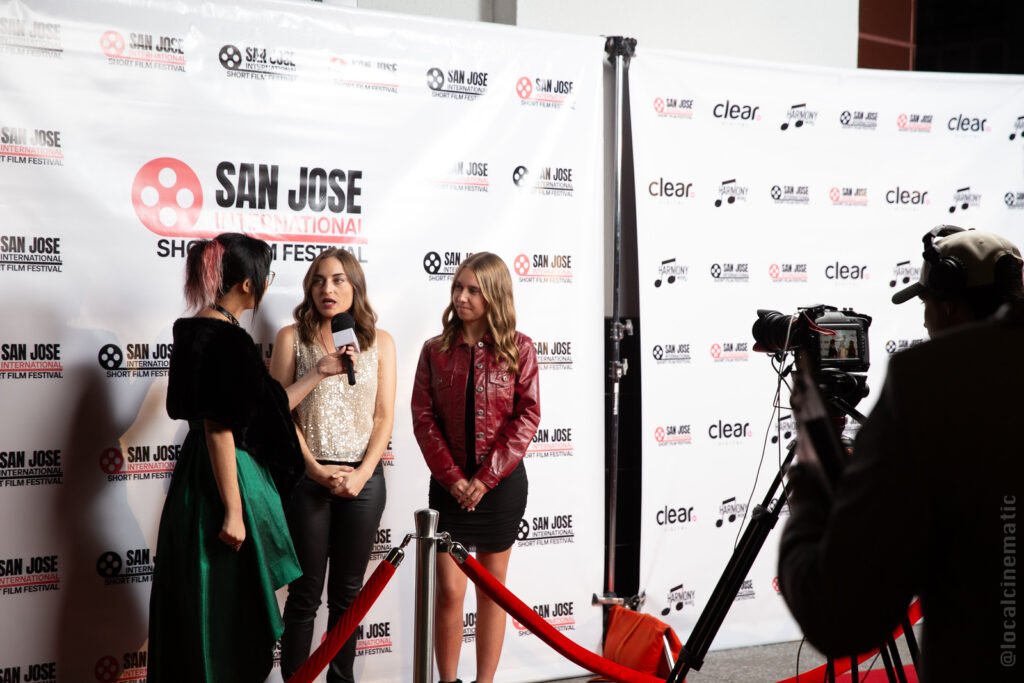 A filmmaker interviewed on the red carpet at the 2024 San Jose International Short Film Festival