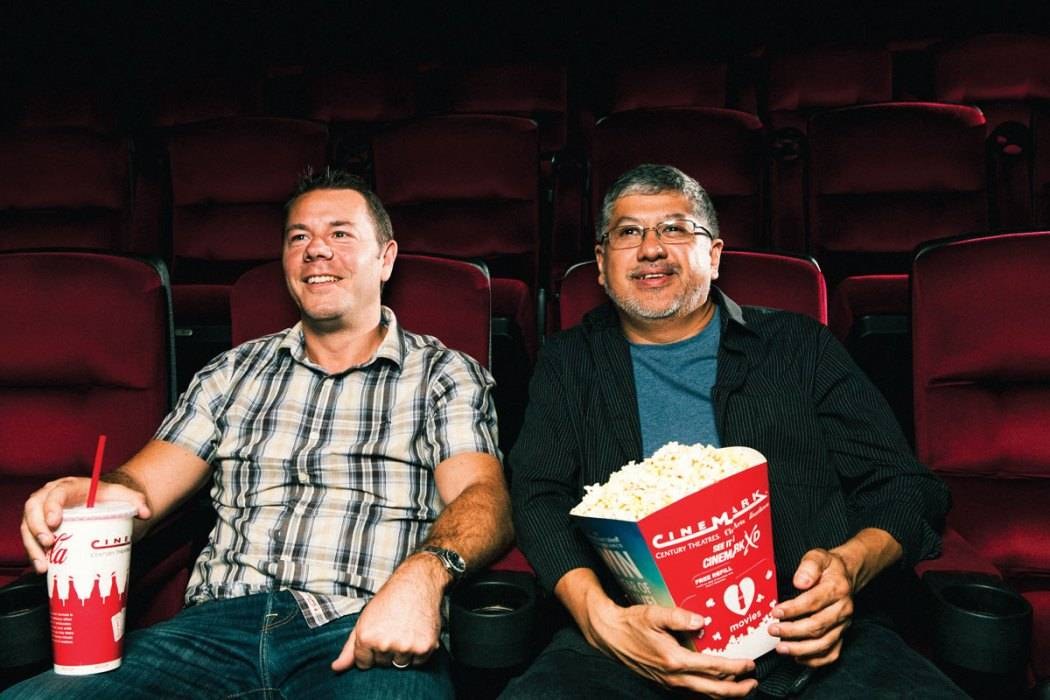 SJSFF co-founders Bill Hargreaves and Sinohui Hinojosa in a CineArts theater with popcorn