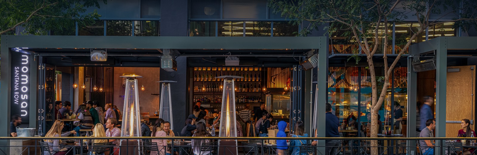 Outdoor dining along the street at Santana Row in San Jose