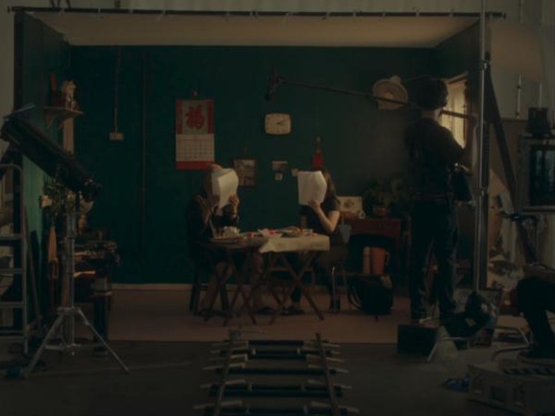 A film set with a camera dolly track in Freedom Swimmer