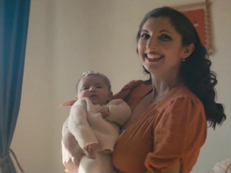 Dr. Jessica Taaffe holding a baby in Not the Science Type