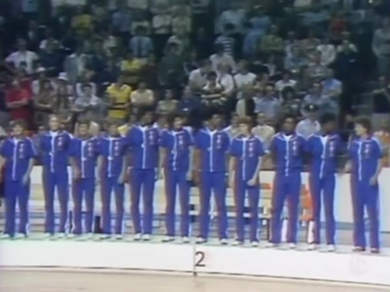 Archival footage of an Olympic medal ceremony in The Queen of Basketball