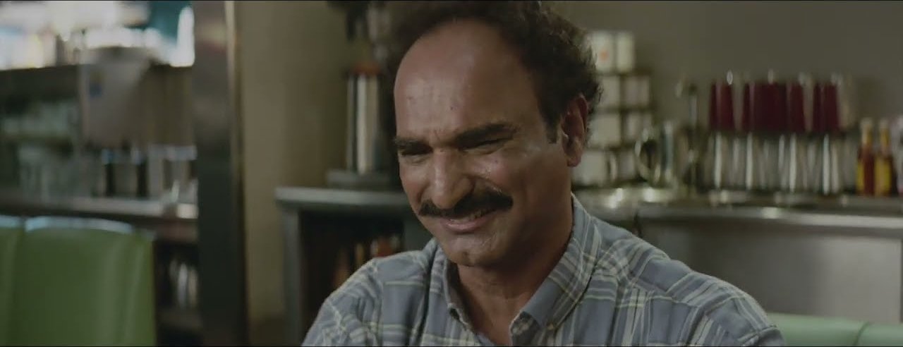 Sid’s father smiles in a still from Coming Out With the Help of a Time Machine
